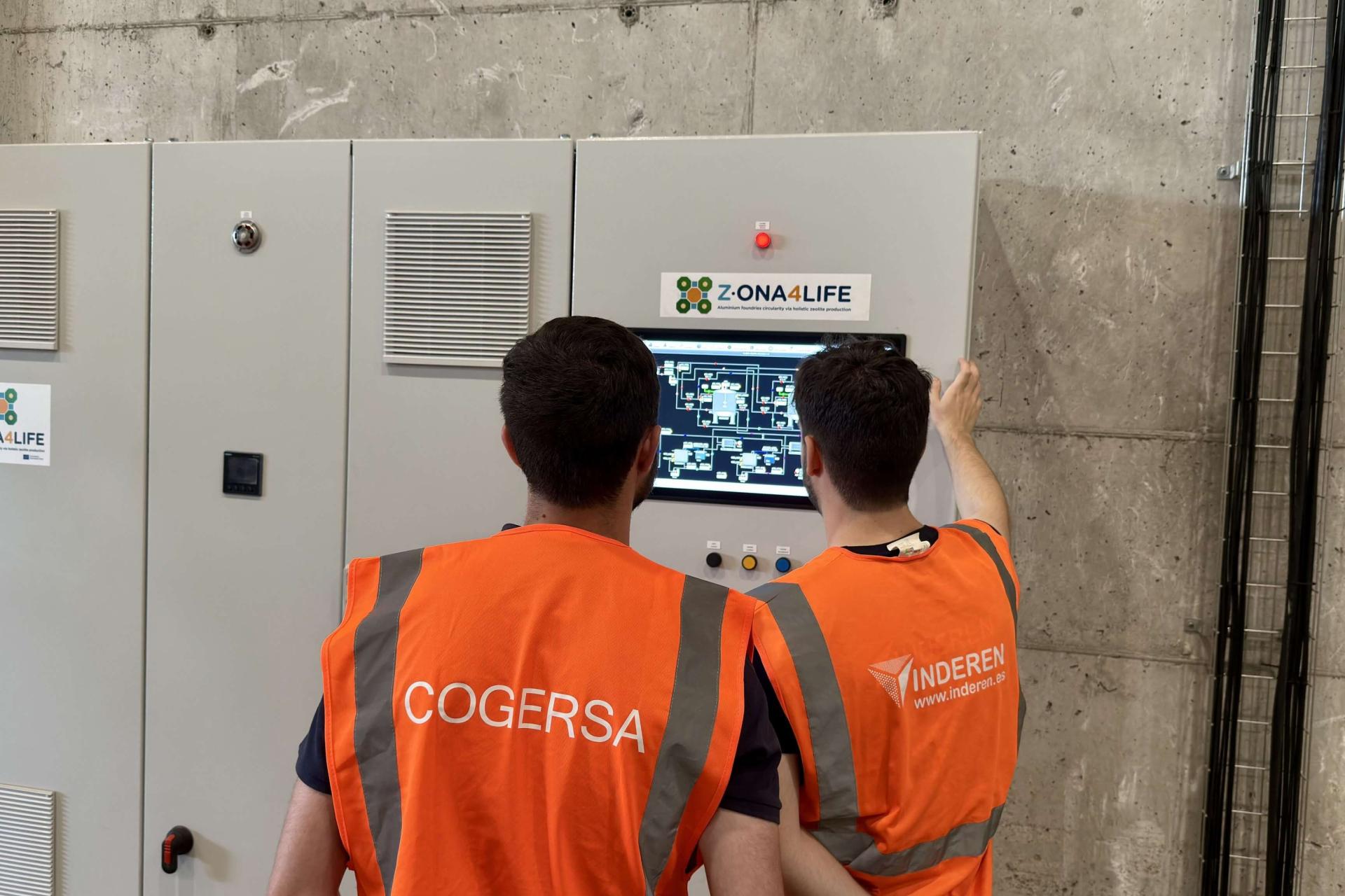 People working at the electrical panel